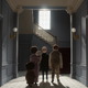 The family in Netflix's The House seeing their new home for the first time.